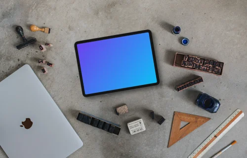 Top view of landscape tablet mockup in the artist atelier