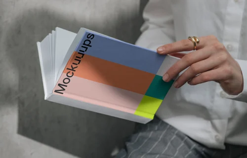 A-format book mockup in a casual setting