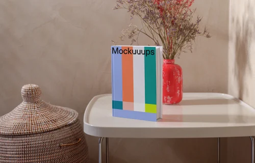 B-format book mockup on a modern side table