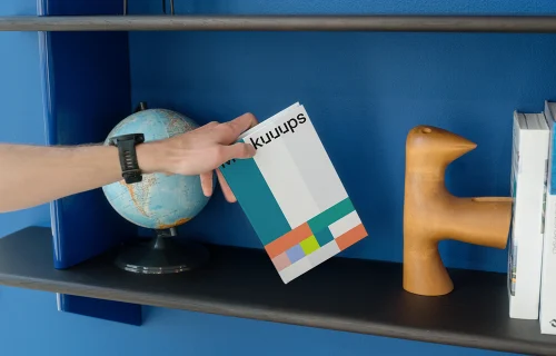 C-format book mockup on a stylish bookshelf