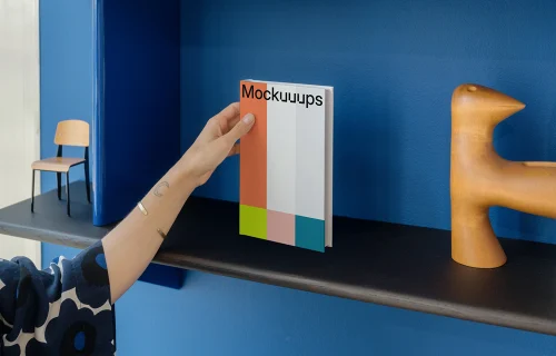 C-format book mockup on a stylish shelf