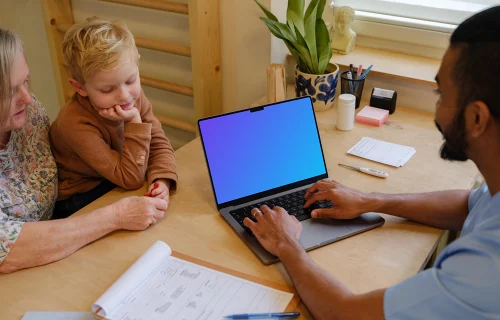 Doctor typing on a MacBook Pro mockup