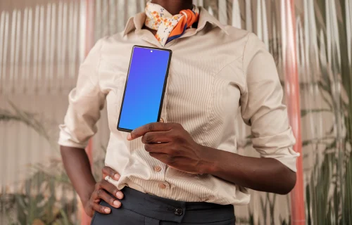 Female entrepreneur holding a Google Pixel mockup