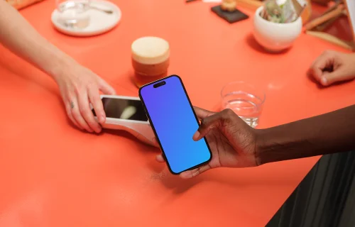 Female entrepreneur holding a iPhone mockup