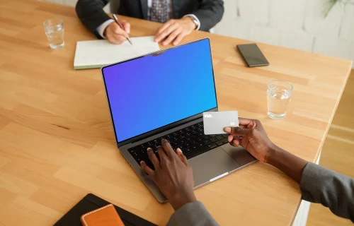Female entrepreneur typing on a MacBook Pro mockup