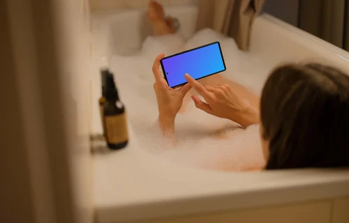 Female in bath typing on a Google Pixel mockup