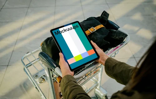 Hands holding an iPad Air mockup