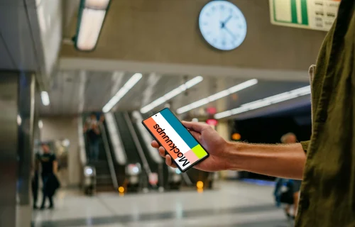 Holding a Google Pixel 6 mockup at the subway station