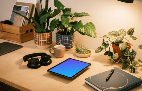 iPad Air mockup beside a black notepad