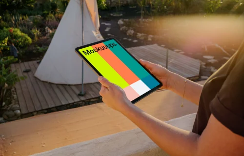 iPad Air mockup held by a female user