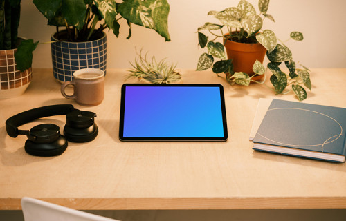 iPad Air mockup in elevated reading position beside multiple potted plants