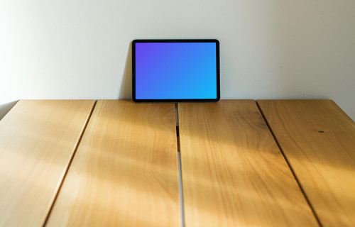 iPad Air mockup in landscape mode leaning on a wall