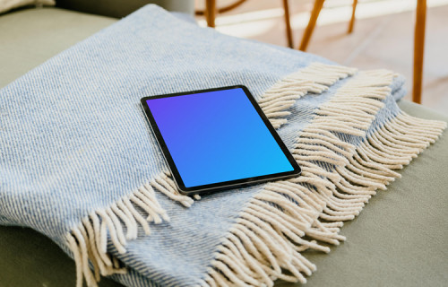 iPad Air mockup lying on a folded blanket