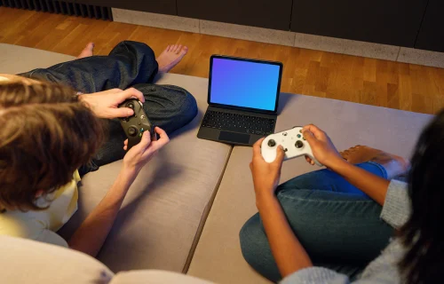 iPad Air Mockup on a Cozy Sofa during Gaming Session
