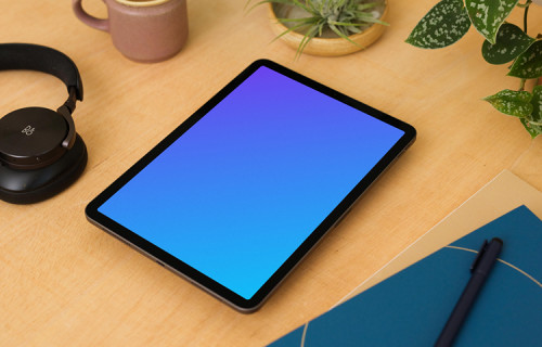 iPad Air mockup on a light brown table.