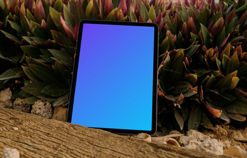iPad Air mockup placed against some plants