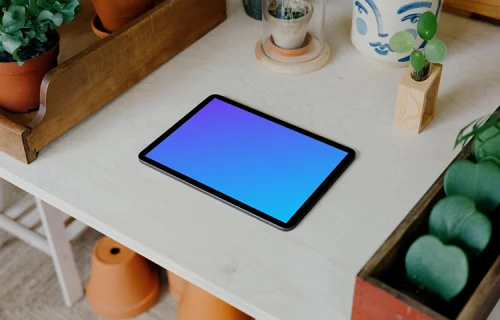 iPad mockup placed flat on a white table