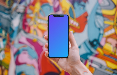 iPhone 12 mockup in a user's hand