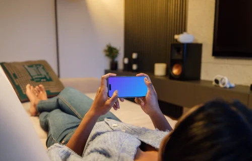 iPhone 15 Pro mockup in relaxed home setting