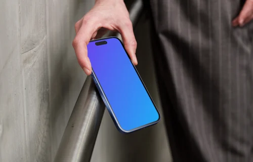 iPhone 16 mockup against concrete background
