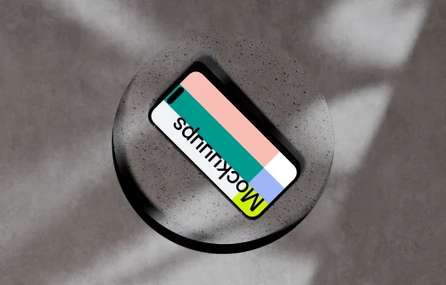 iPhone 16 mockup on a textured concrete surface