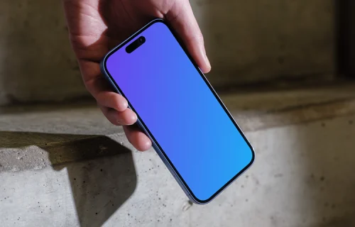 iPhone 16 mockup on concrete stairs