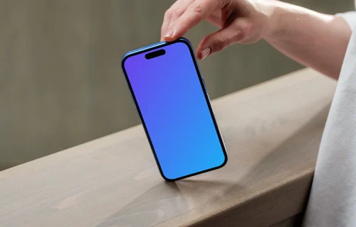 iPhone 16 mockup on industrial ledge