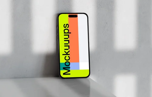 iPhone 16 mockup on marble with soft shadows