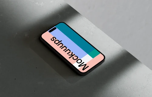 iPhone 16 mockup on textured marble surface