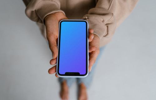 iPhone mockup held with two hands