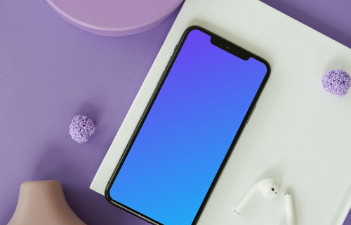 iPhone mockup on a purple table