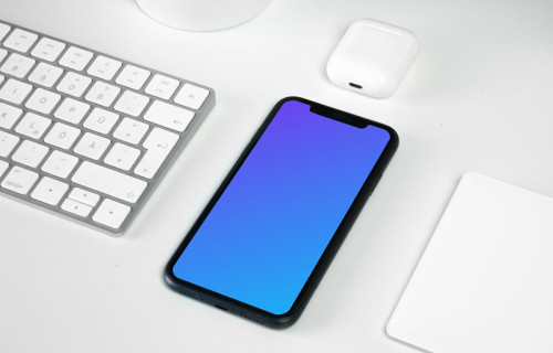 iPhone mockup on a workstation