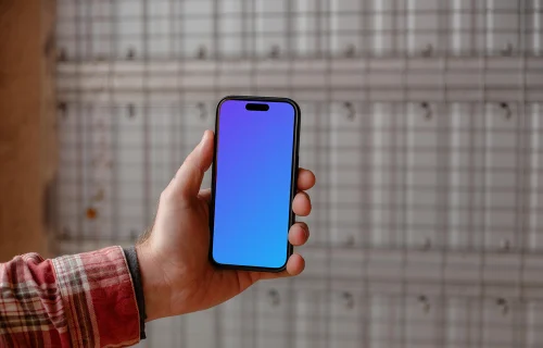 iPhone mockup with construction background