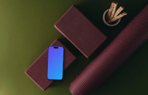 iPhone mockup with equipment for practicing yoga