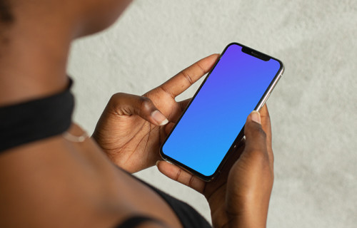 Lady using an iPhone 12 mockup