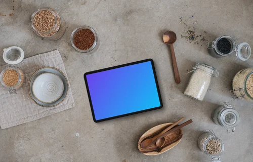 Landscape tablet mockup next to the jars