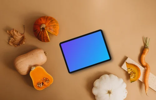 Landscape tablet mockup next to the pumpkin