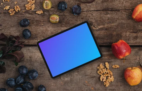 Landscape tablet mockup on wooden table