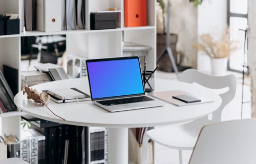 Laptop mockup in an office setting