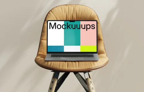 MacBook Air mockup on a modern chair