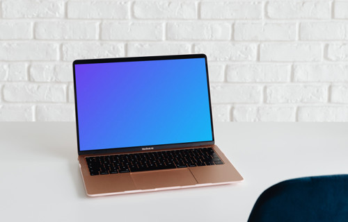  MacBook Air mockup on a table with a white background