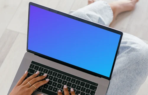 MacBook Air mockup on a user's lap
