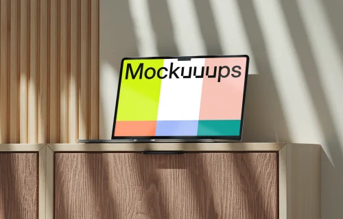 MacBook Air mockup on a wooden cabinet with natural light