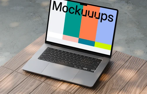 MacBook Air mockup on a wooden surface