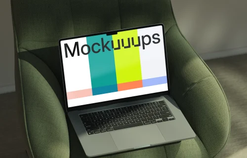 MacBook Air mockup on green chair in natural light