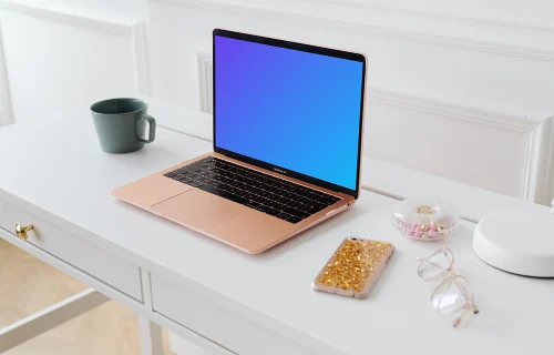 MacBook Air mockup with an iPhone at the side