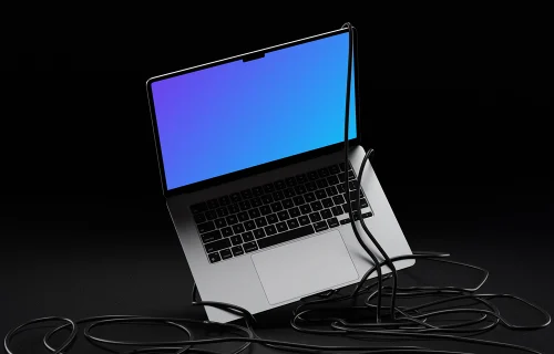 MacBook Air mockup with tangled cables on dark background