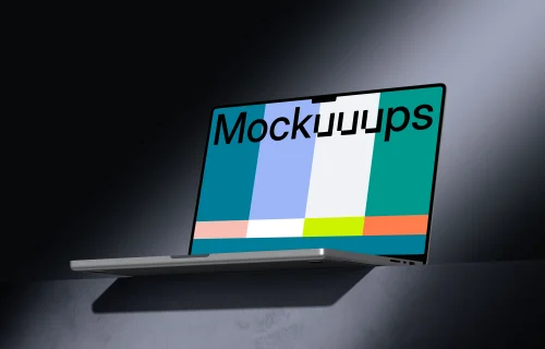MacBook Pro 16 inch mockup on a textured tabletop with dramatic lighting