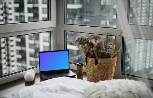 MacBook Pro mockup in a luxury bedroom