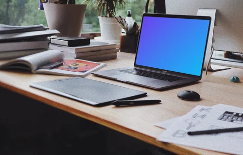 MacBook Pro mockup in front of a notepad